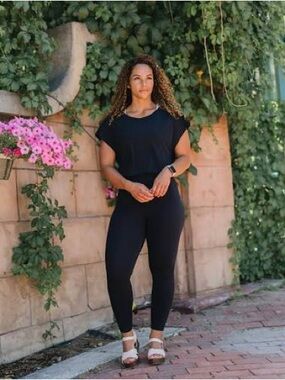 Zyia Black Soho Jumpsuit, size large. Brand new with tags and bag!!!